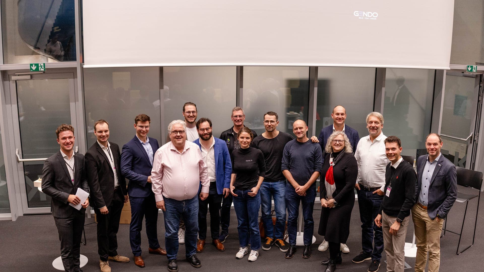 Speakers and organizers gathered after a Young AI Leaders event
