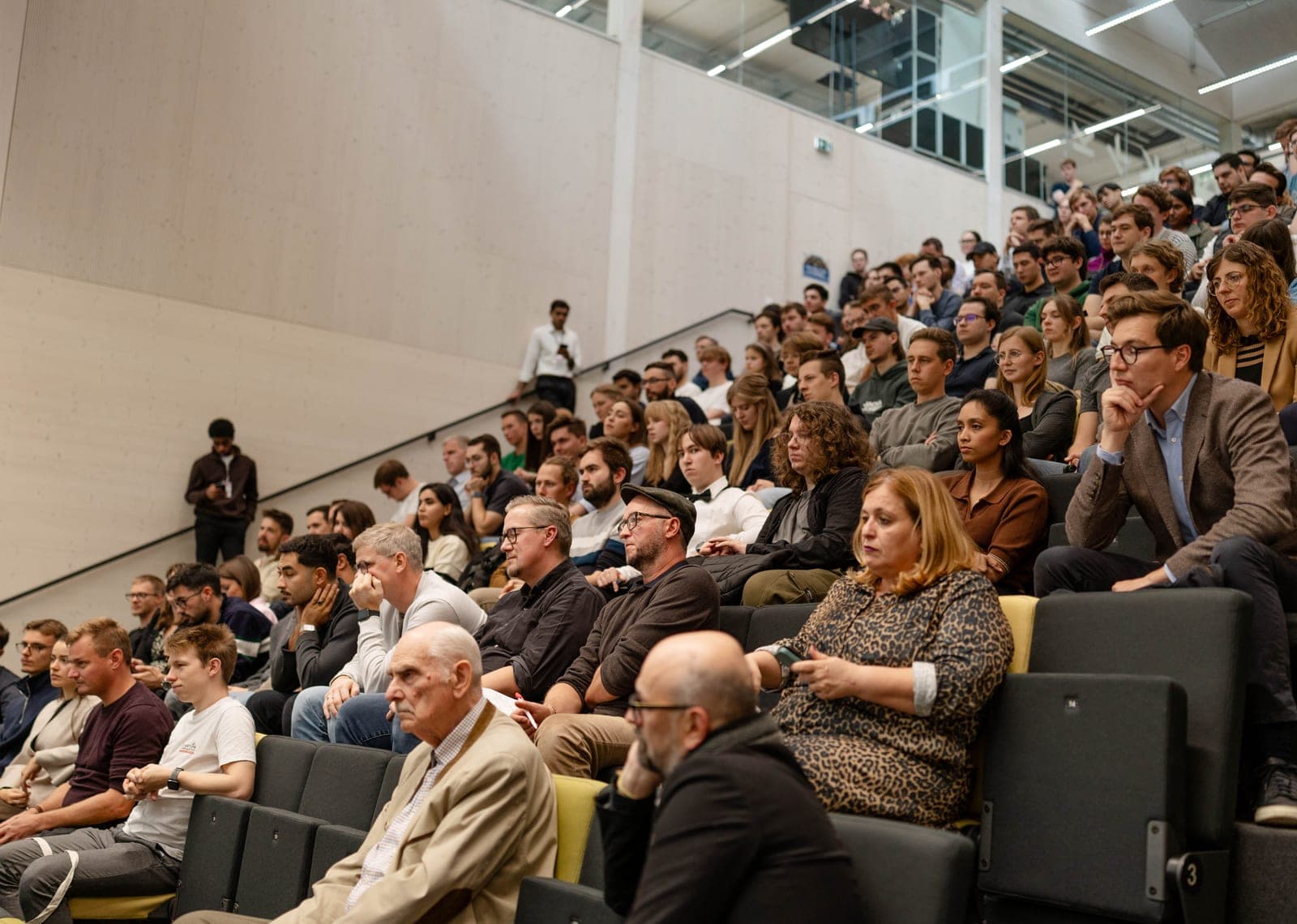 Audience listening during an AI Academy session
