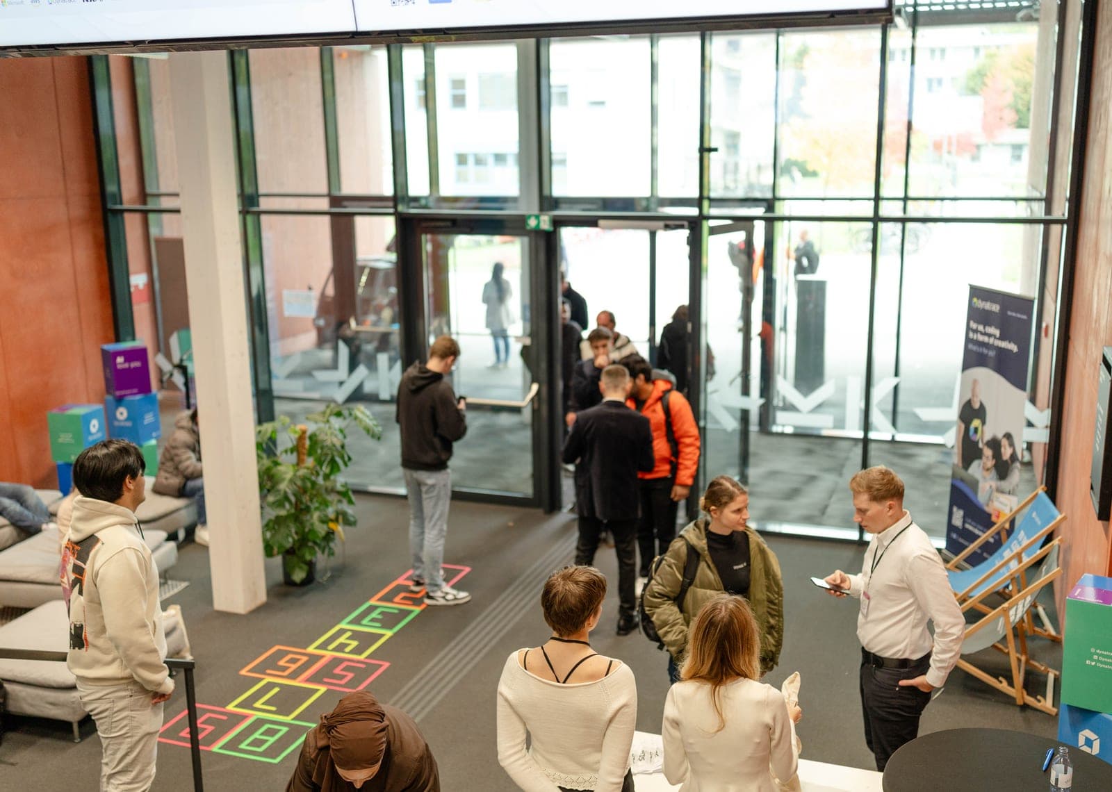 Community gathering in a bright event lobby