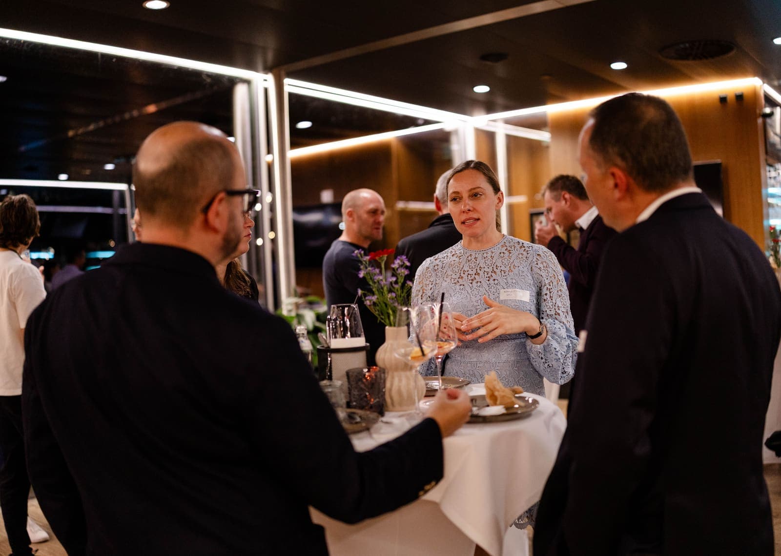 Industry leaders networking at a Young AI Leaders event