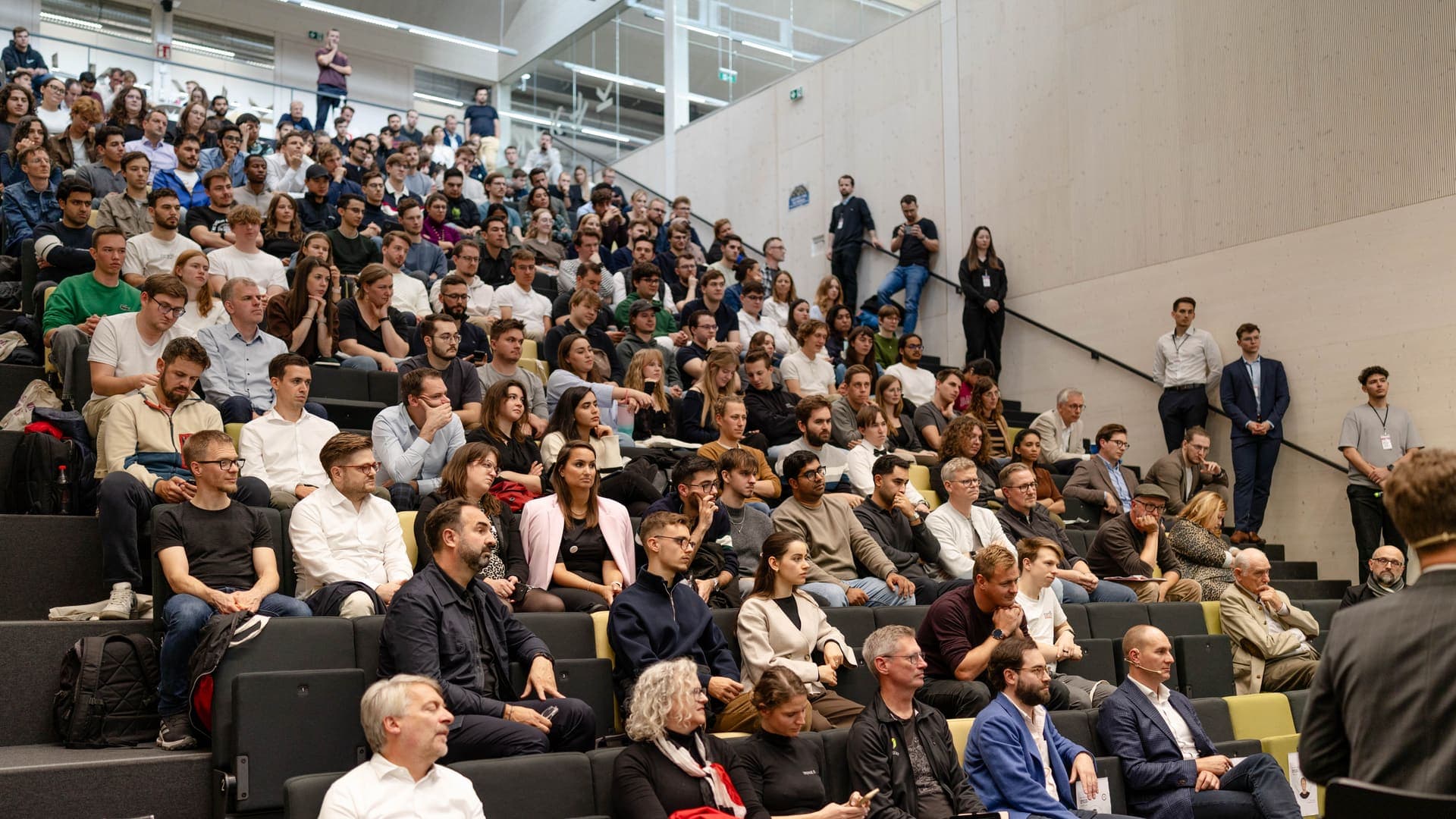 Large audience filling the auditorium